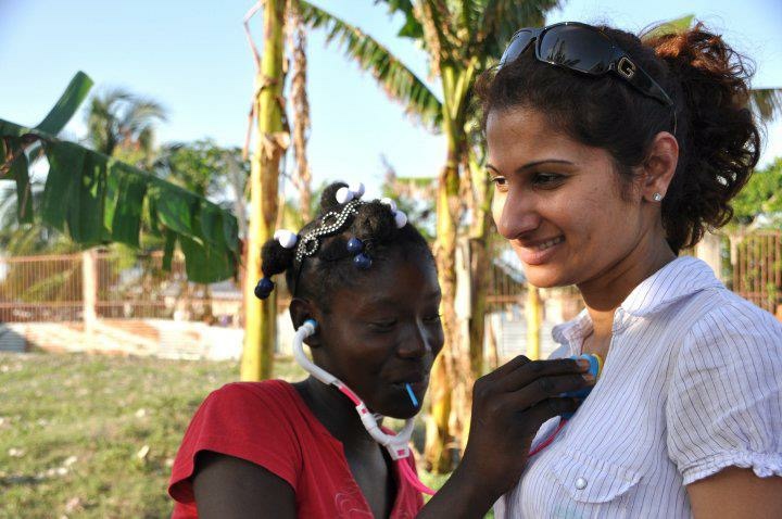 Diane Bacchus supporting community recovery efforts in Haiti after the earthquake